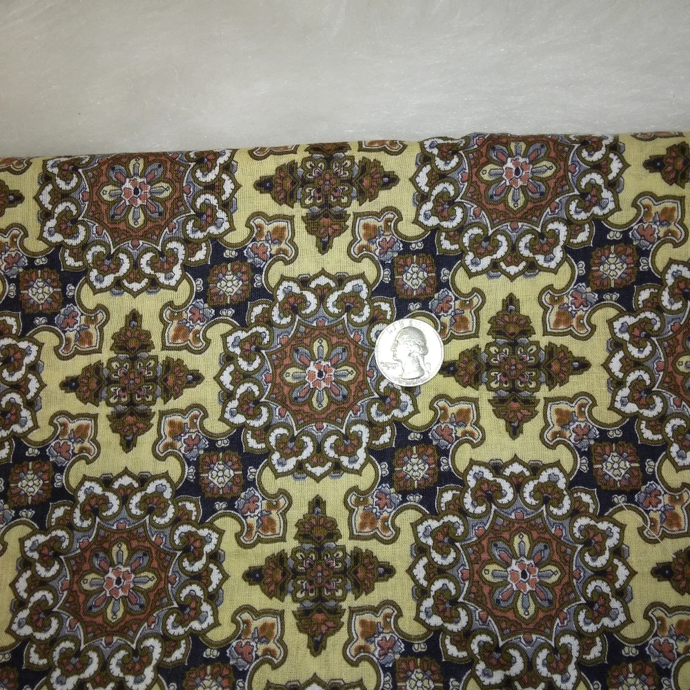 FABRIC Vintage Brown on gold regularly set stylized medallions 1 yd +
